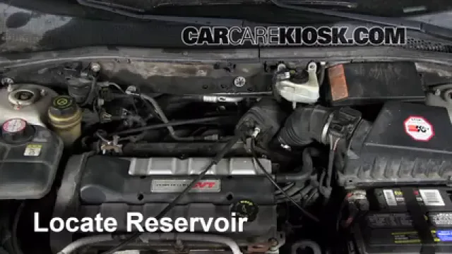 2002 Ford Focus ZX3 2.0L 4 Cyl. Líquido limpiaparabrisas Agregar líquido